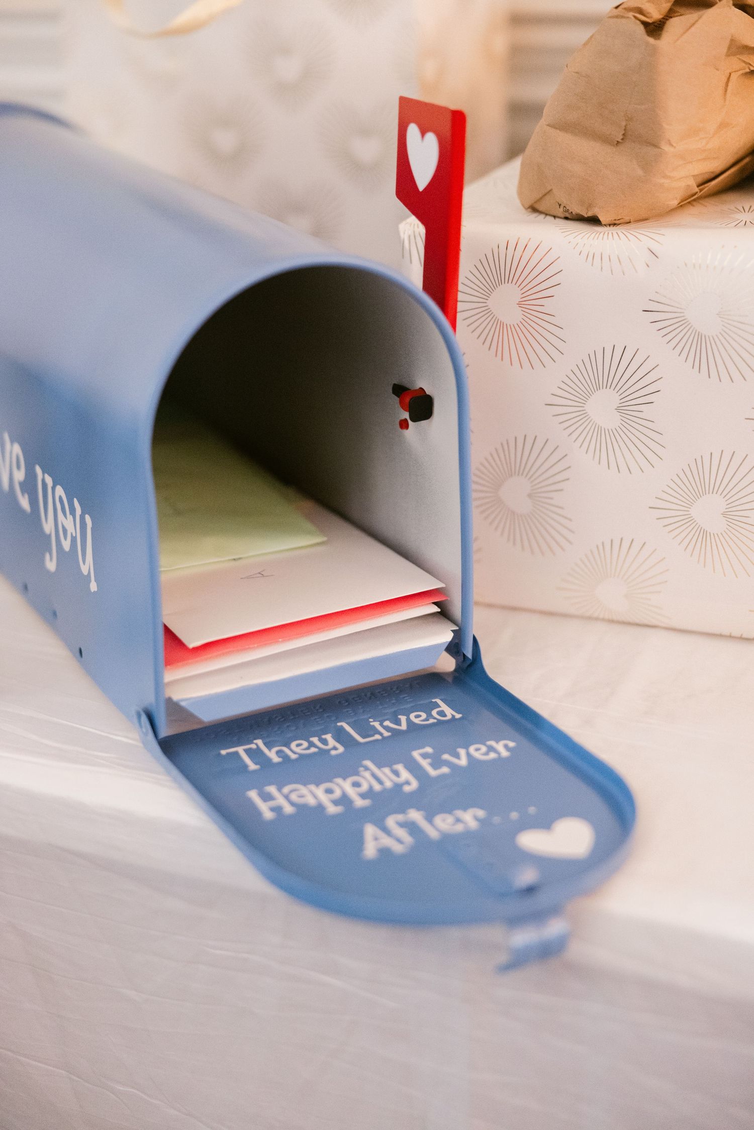 Close-up shots of a fairy tale style pop-up book with blue pages showing text.