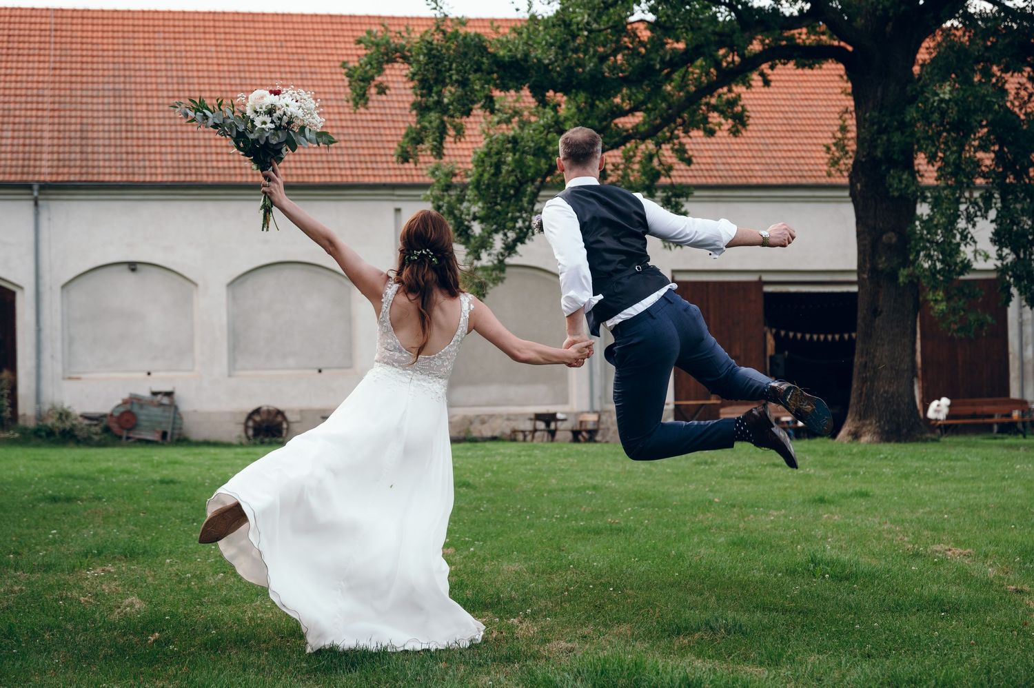 A flowing white wedding dress twirls gracefully across a green lawn in a series of dynamic motion shots.