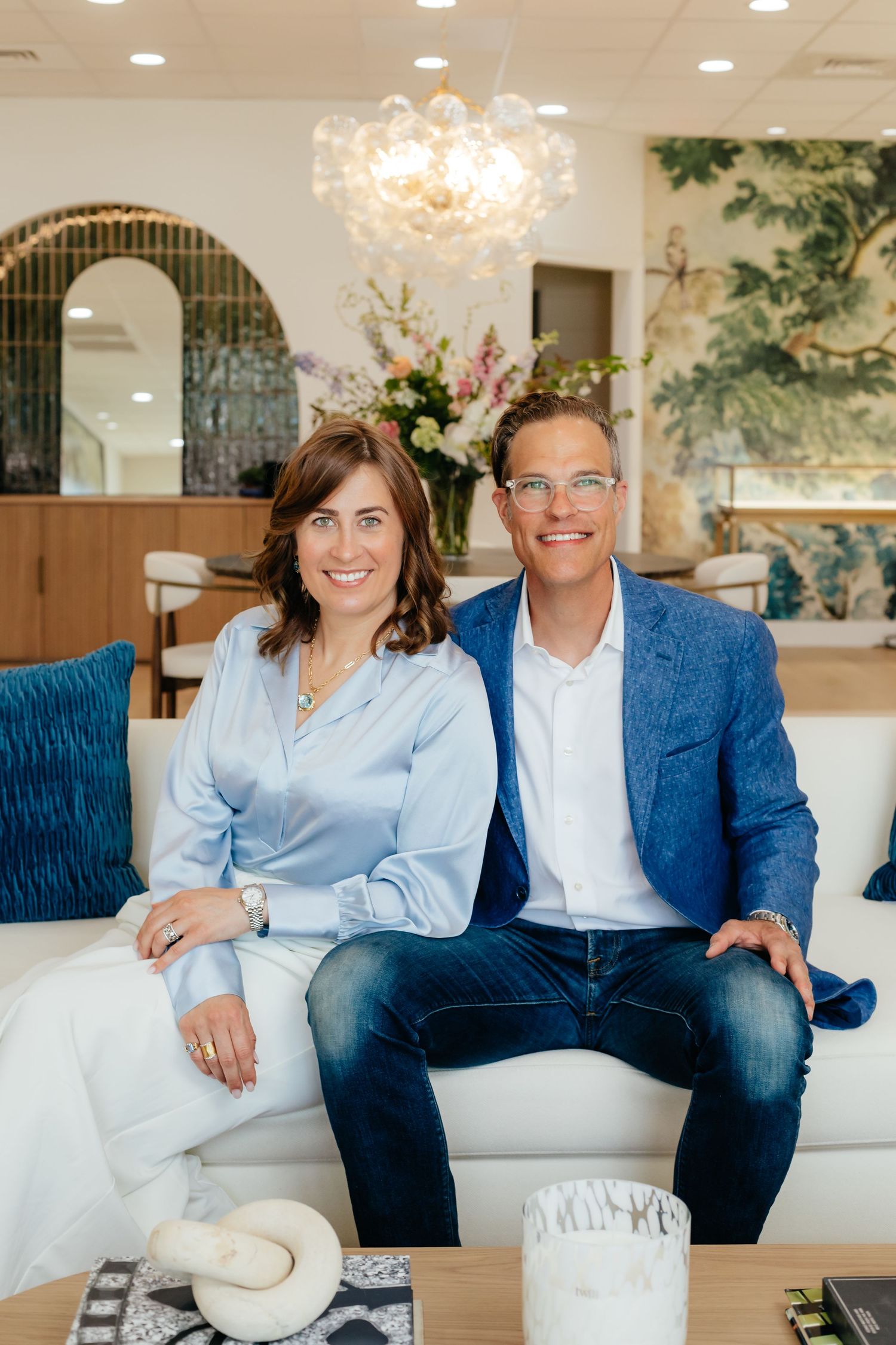 Golden Hour Jewelers Natalie and Kevin sitting in store