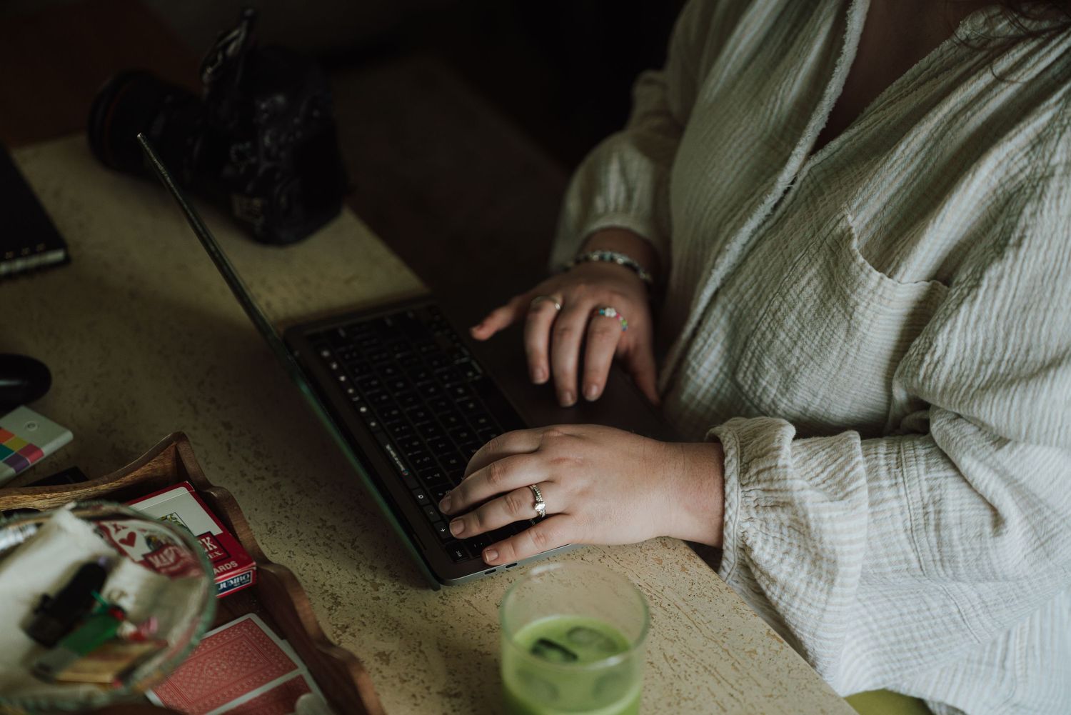 Leigh typing on laptop