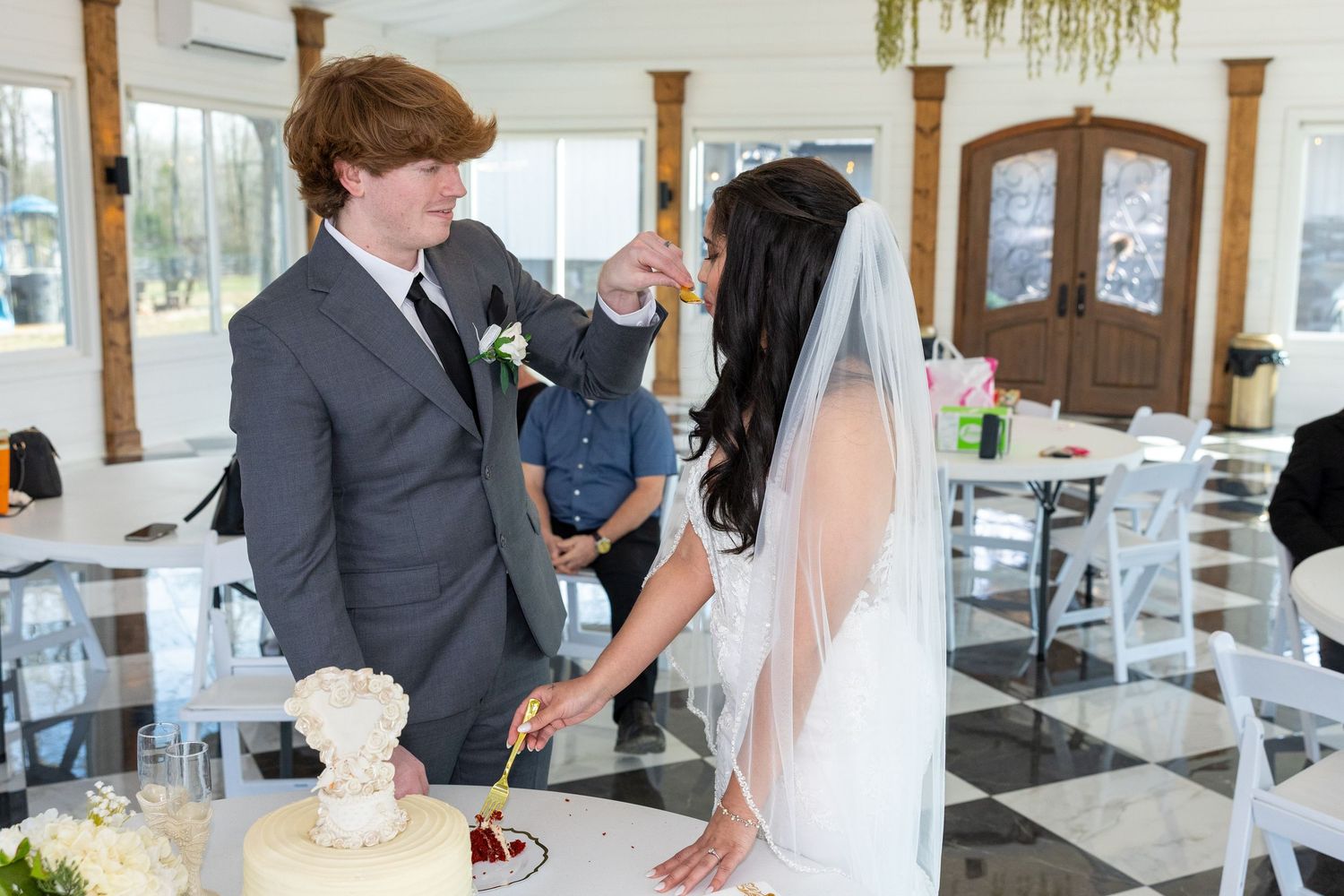 A wedding reception montage showing elegant table settings, dancing, and celebrations in a bright banquet hall.