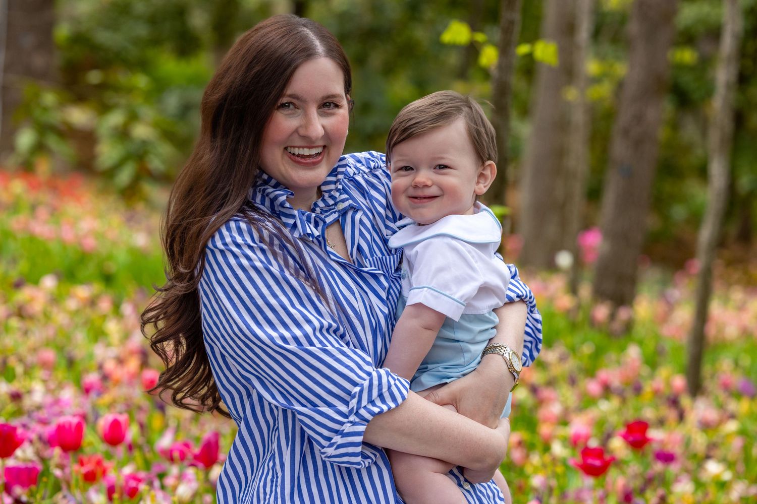 A series of outdoor photos in a garden with pink flowers showing joyful moments in blue and white striped clothing.