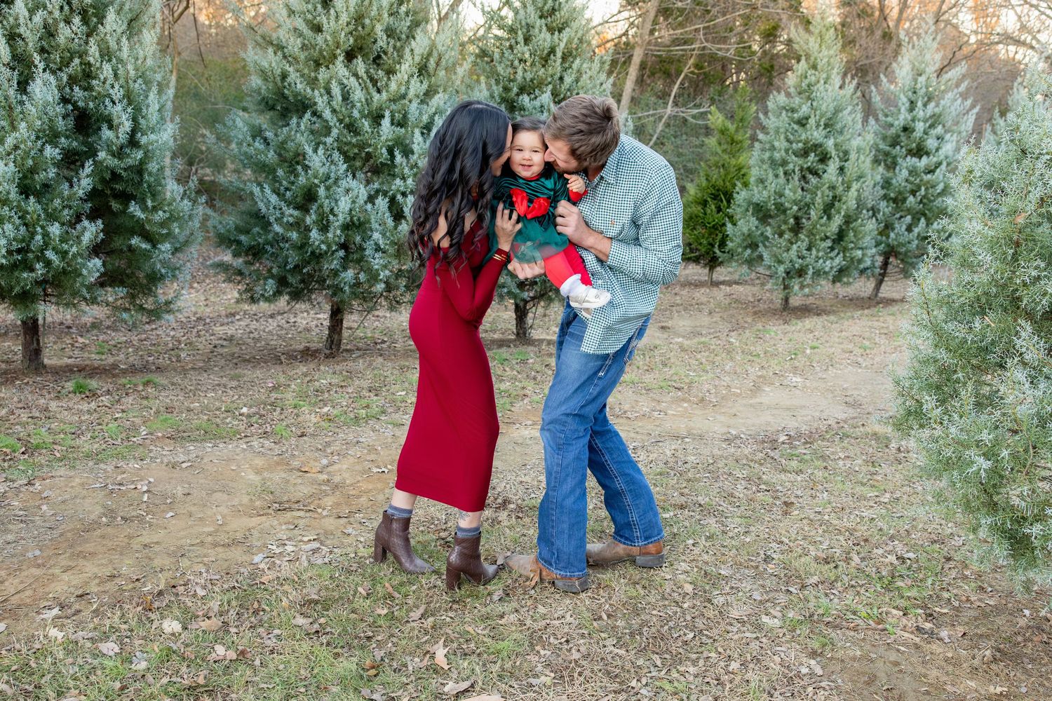 Candid family moments captured during golden hour among evergreen trees in a park setting.