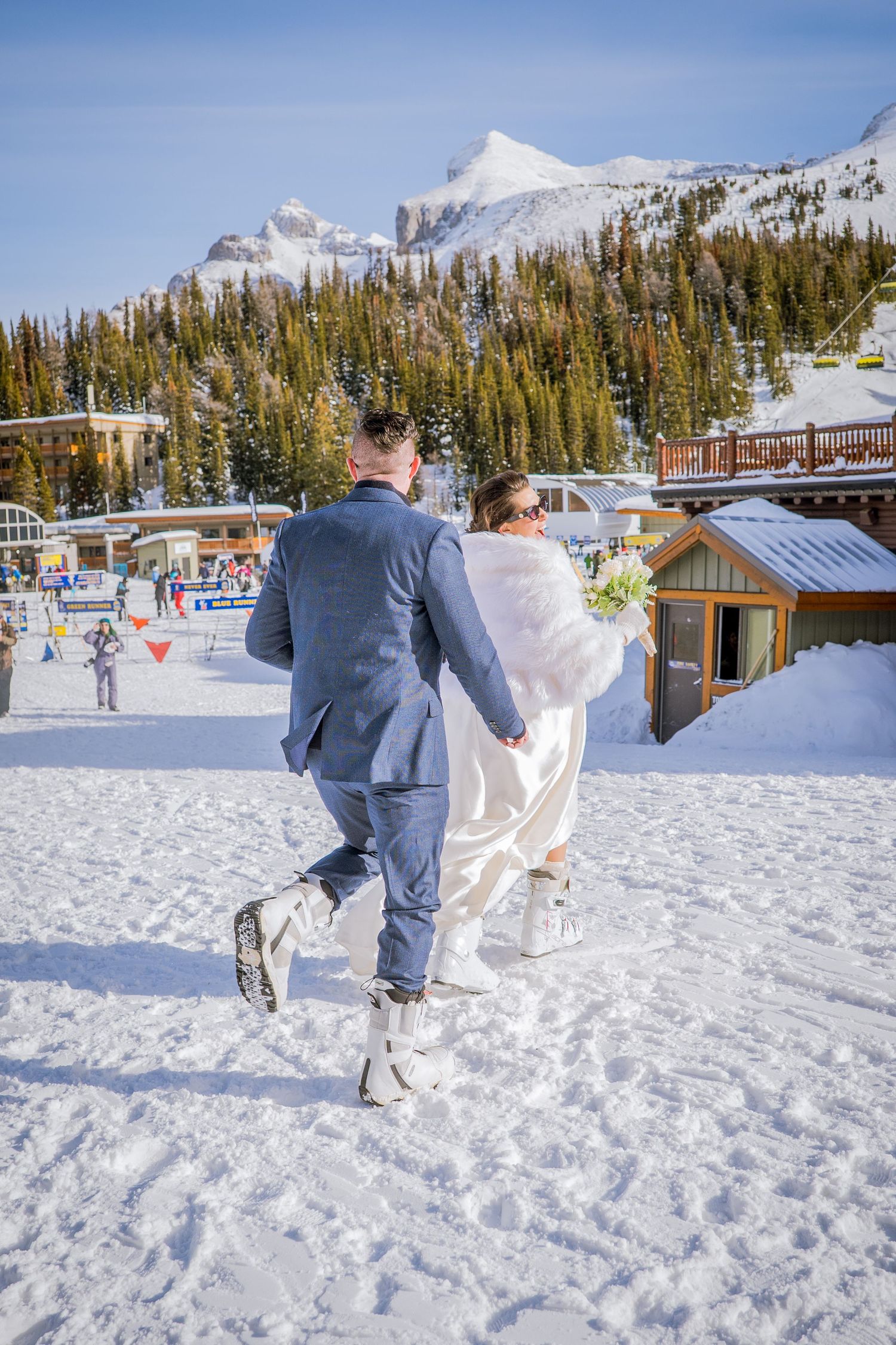 A sequence of photos showing someone setting up beach chairs in snowy winter conditions at a mountain ski resort.