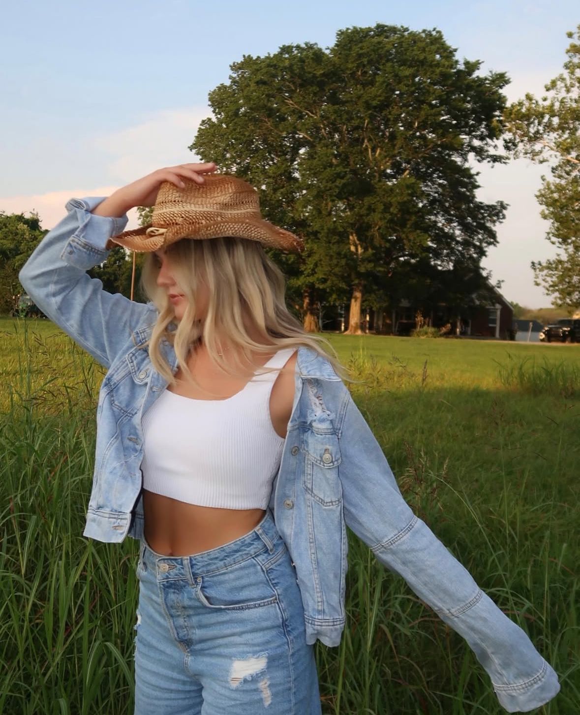 Editorial western fashion portrait session in Nashville Tennessee featuring cowgirl styling and outdoor natural light