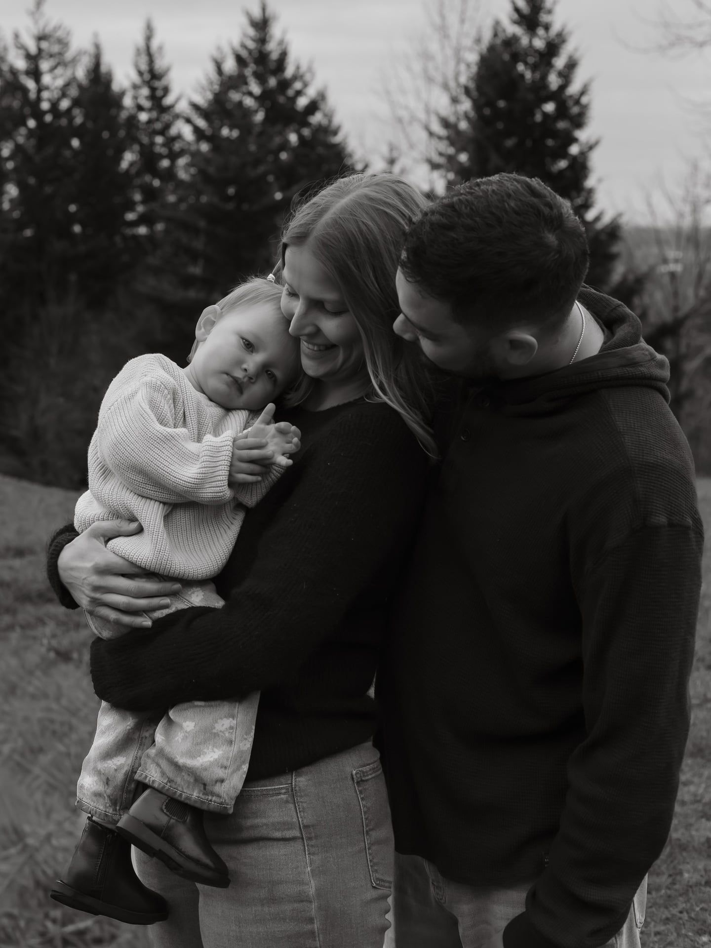 family hugging in black and white Close-up family portrait in Arizona outdoor setting with natural light