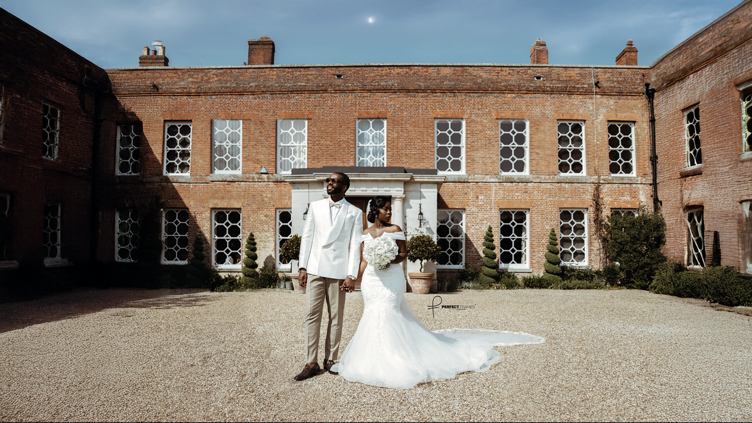 out door exclusives with bride and groom under the kiss of sunlight
