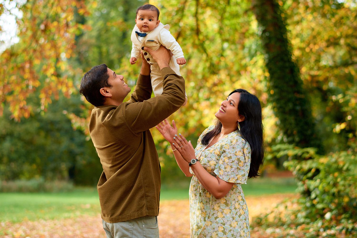 Candid family moments captured in a series of outdoor photos during fall season.