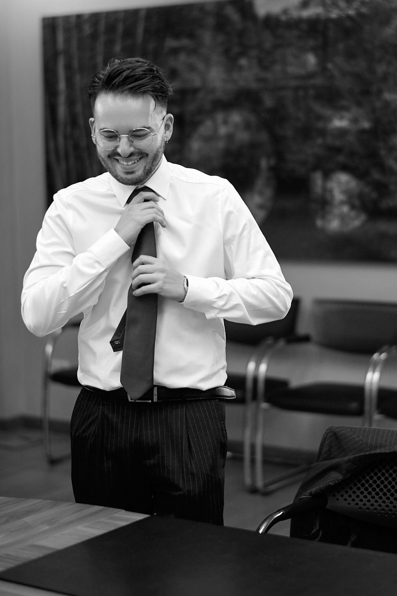 Black and white photo sequence showing emotional reactions during a wedding preparation.