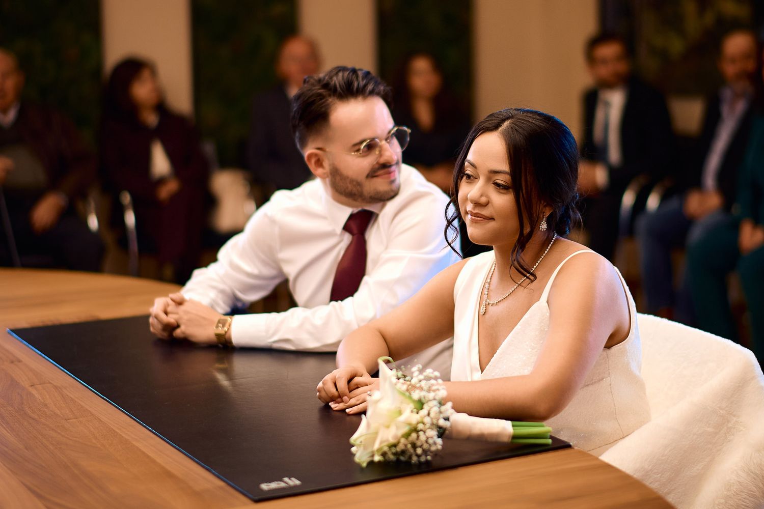 Wedding reception photos showing intimate moments between newlyweds at their celebration.