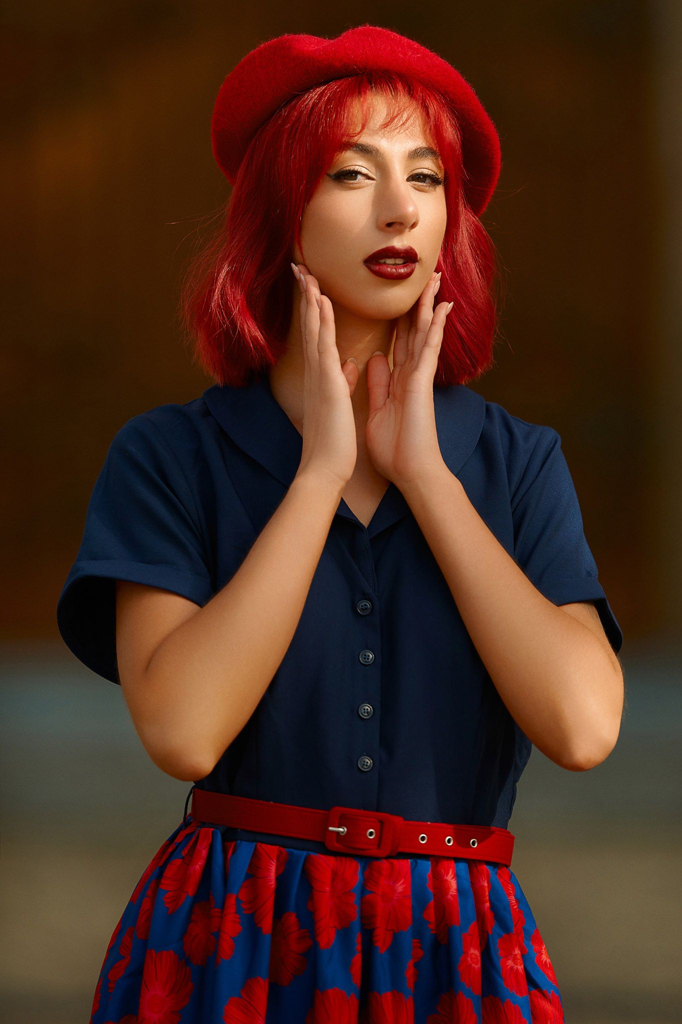 Retro-inspired portraits featuring red hair, navy dress, and matching red beret.