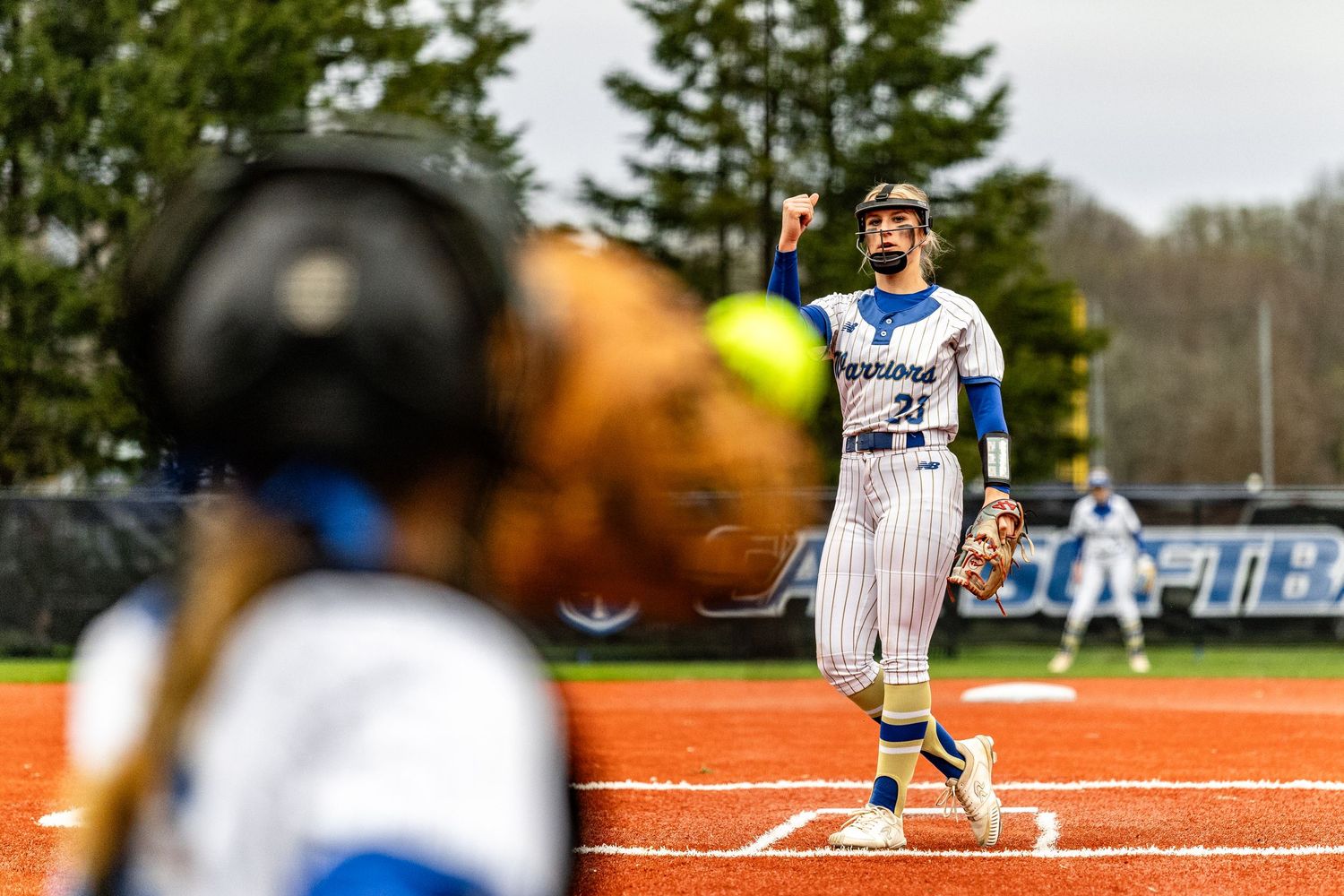 Pitcher Emily Bogotski throws a strike against Midway High School