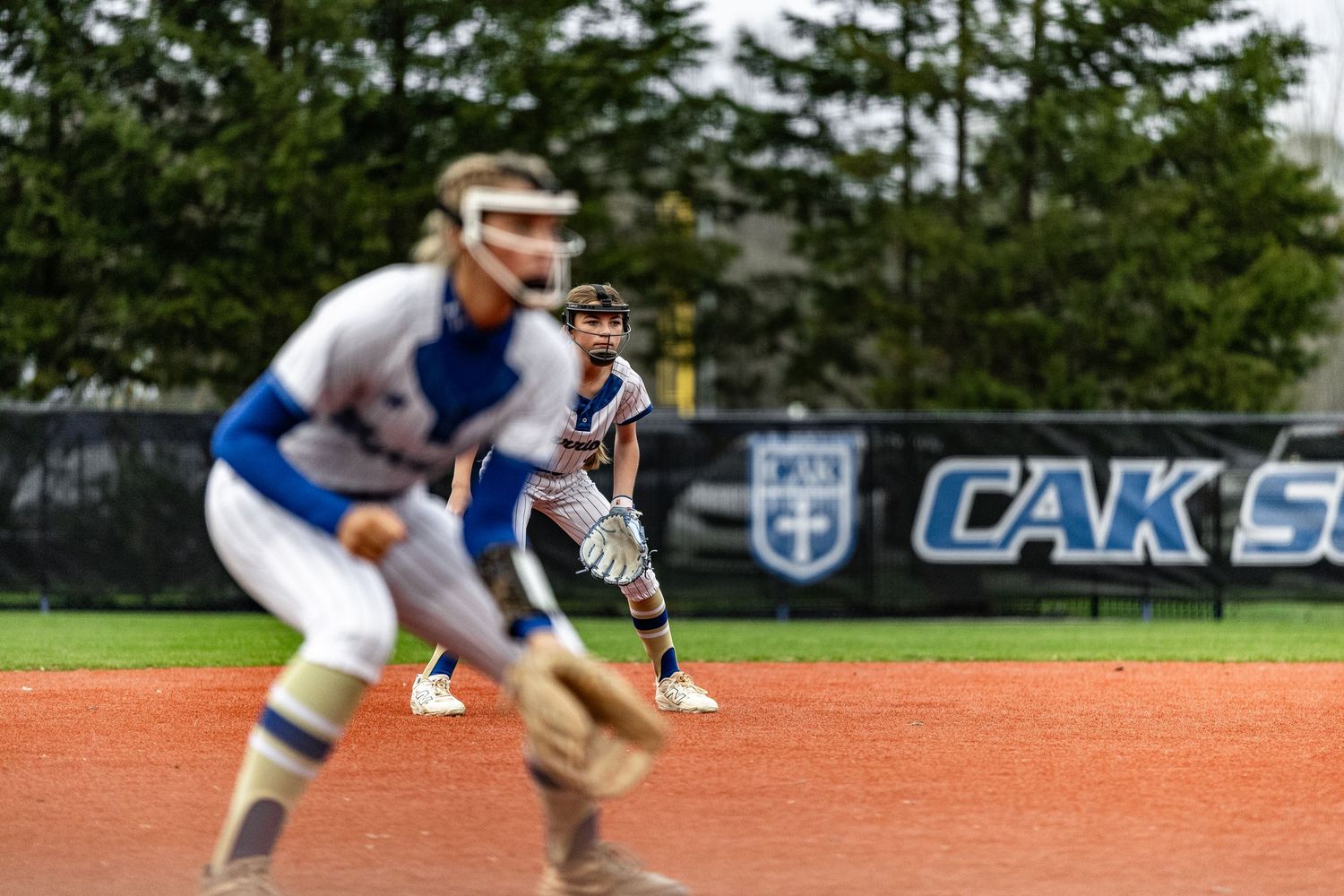 Player Lulu Tarbox gets ready for a ball hit her way