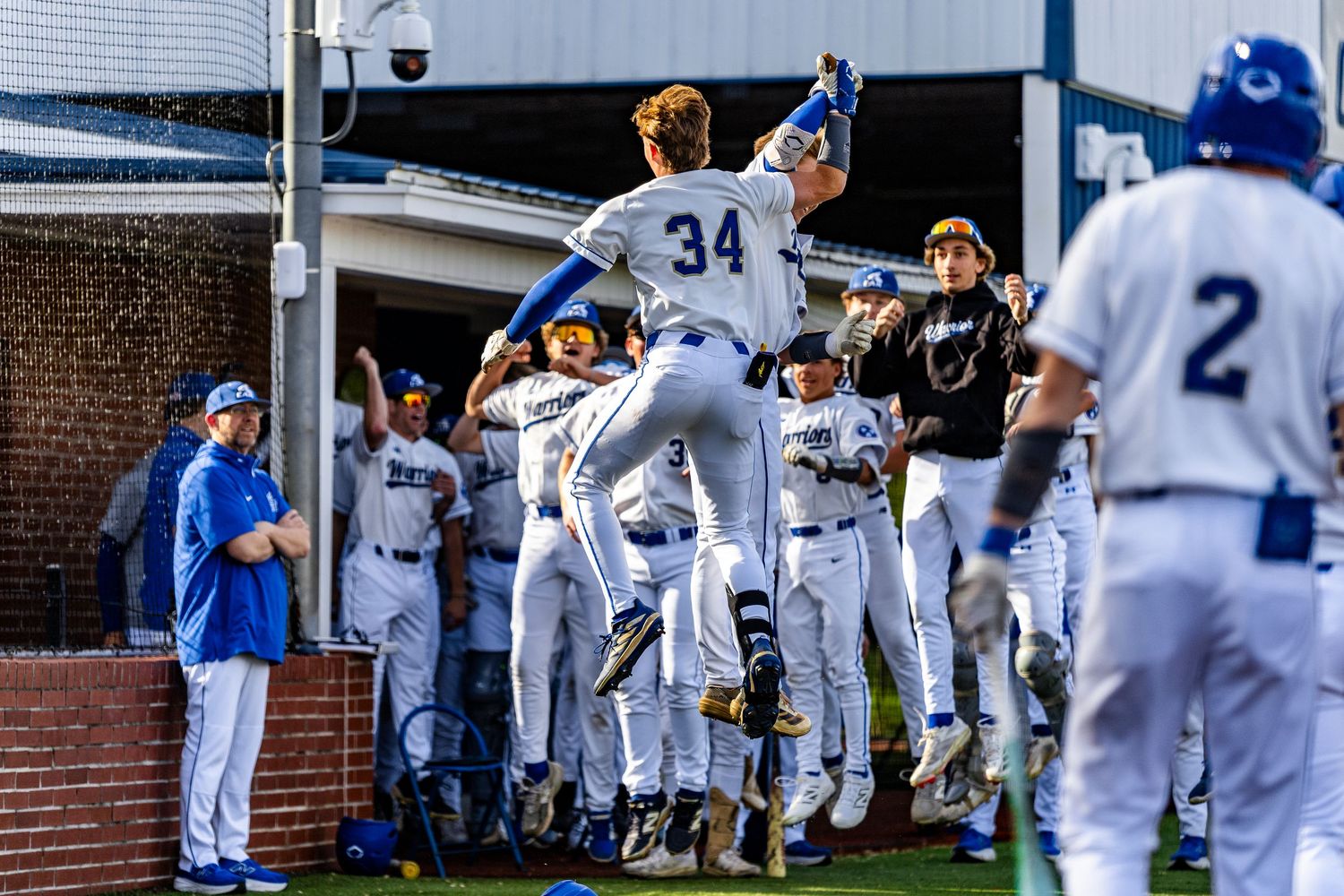 Players Wyatt Jones and Cannon Hilde celebrate a home run against Concord High School