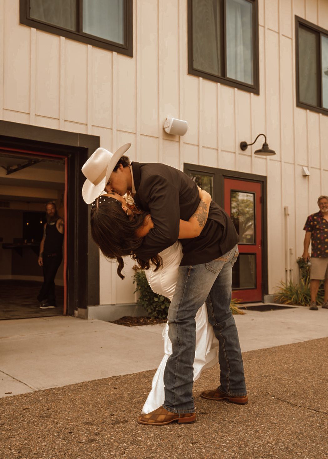 Series of photos showing someone bending down on gravel outside a white building.