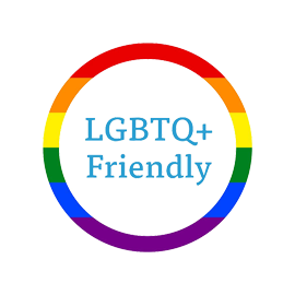 Rainbow circle logo with LGBTQ+ Friendly text in blue letters.