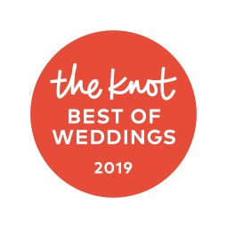 The Knot Best of Weddings 2019 award badge in red and white circular design.