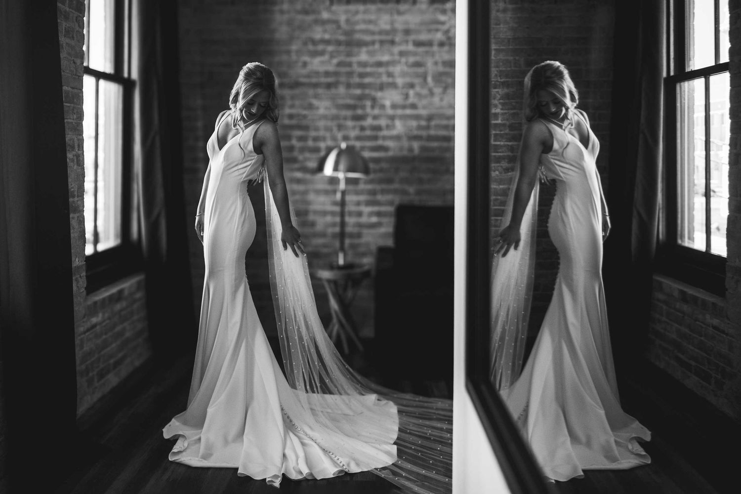 A romantic wedding dress session in an industrial brick loft with dramatic lighting and flowing white gowns.