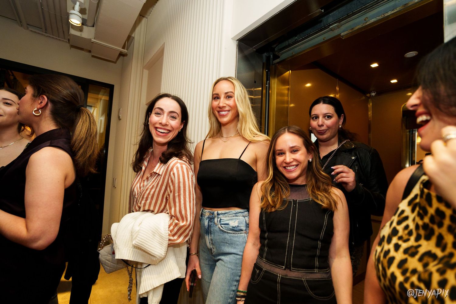 Group of friends enjoying a night out at a social gathering.