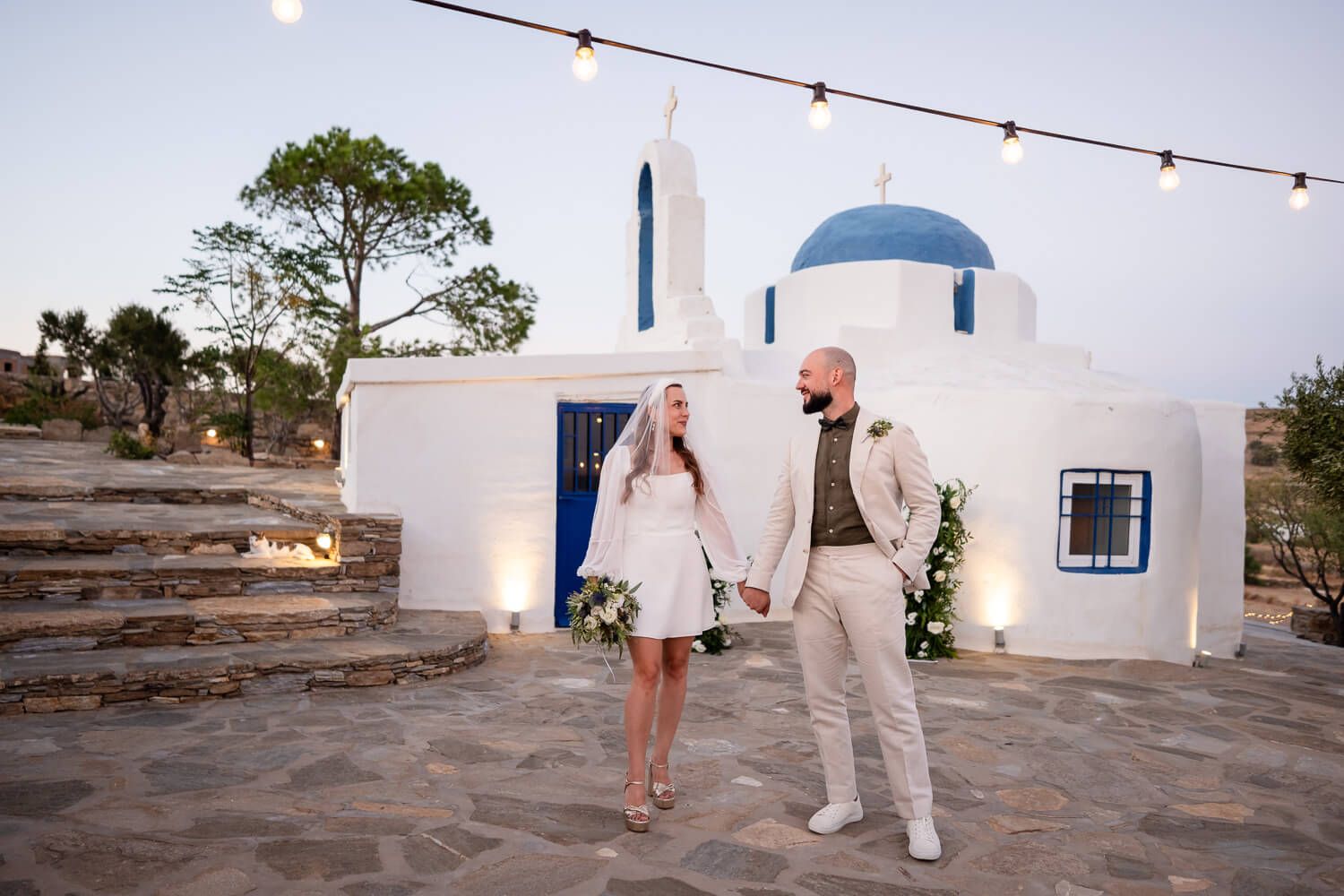 Bride and groom posing  at The Secret View venue