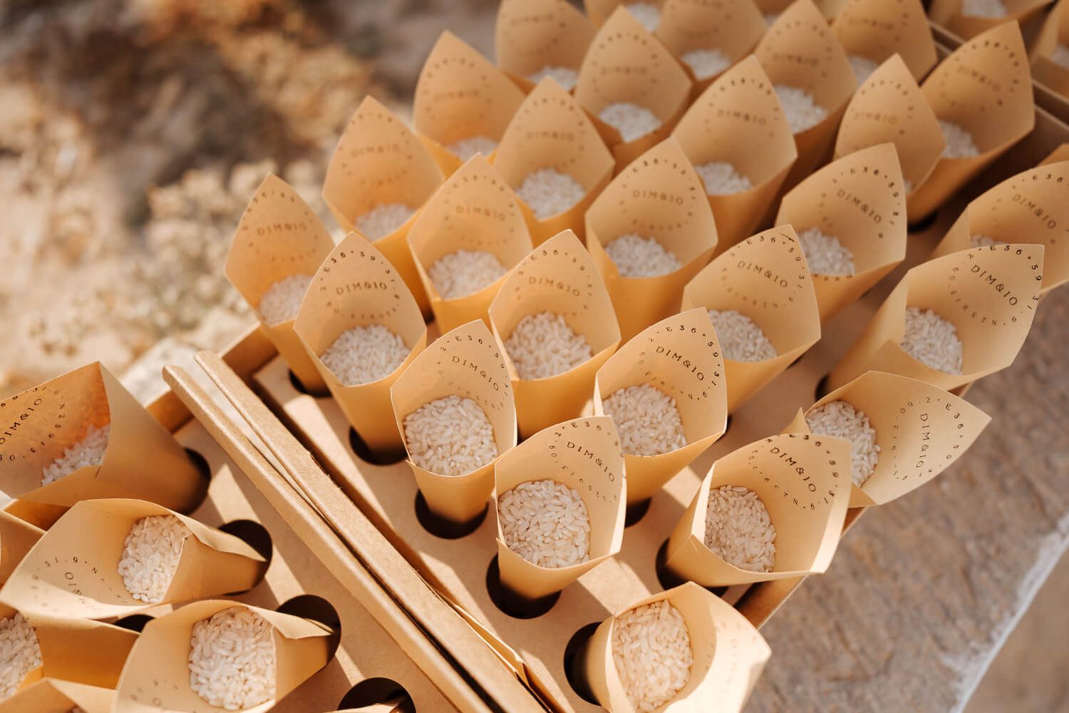 Detail shot of the rice cups for a wedding in Paros