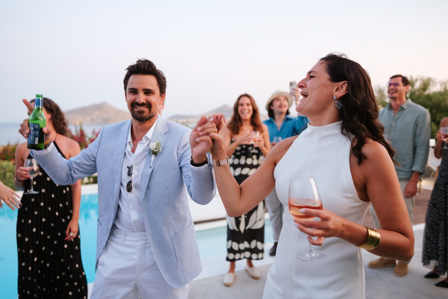 Couple dancing at a wedding party in Paros Greece