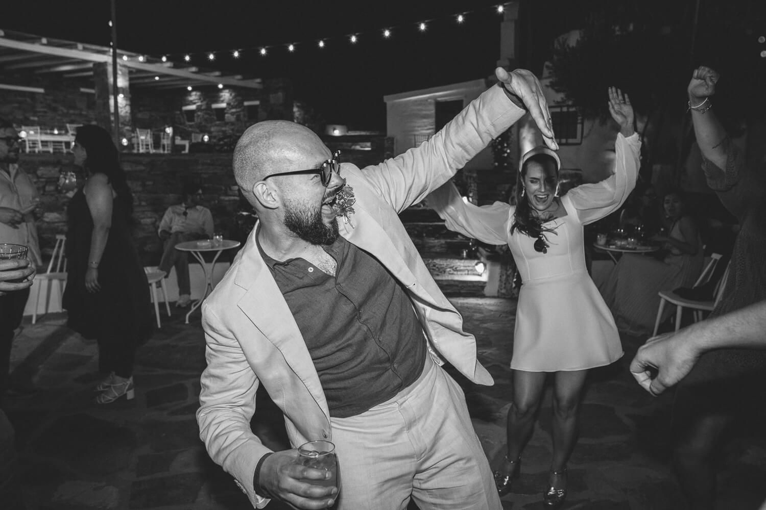 DJ playing international hits while guests dance and celebrate at The Secret View