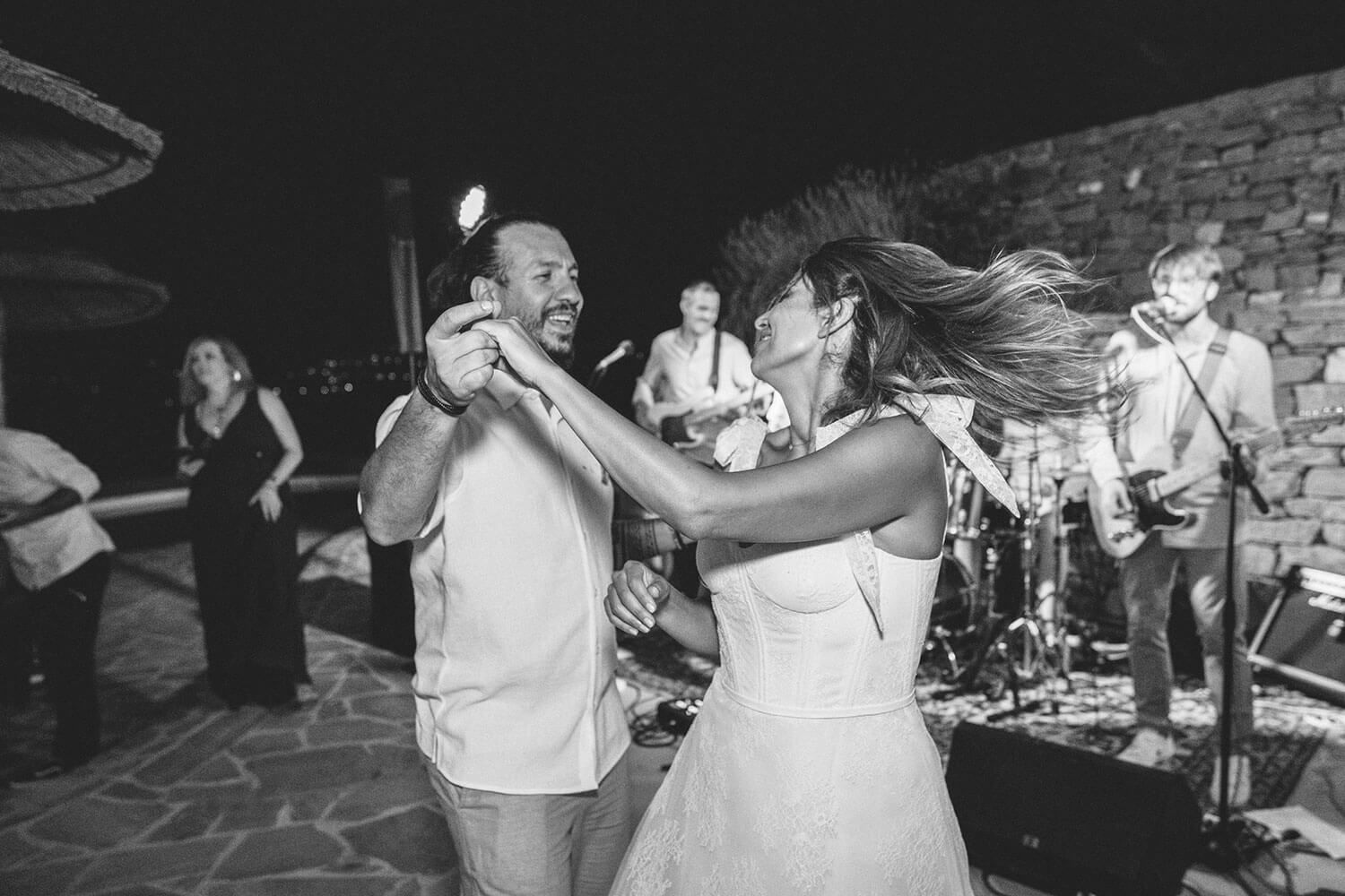 The couple sharing a romantic but fun first dance under the stars