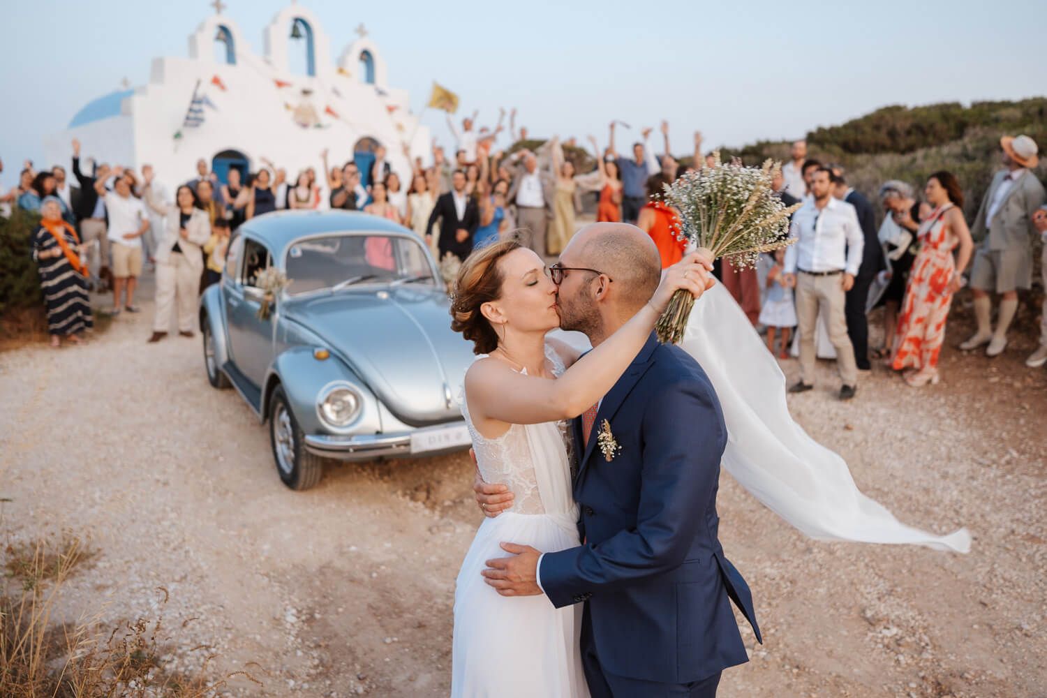 Intimate moment between the bride and groom captured by a Paros wedding photographer