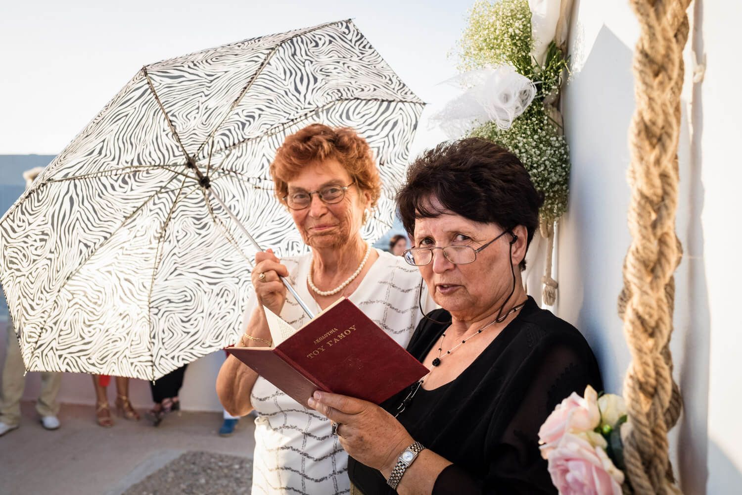 Wedding ceremony at Agios Konstantinos church by the sea in Milos