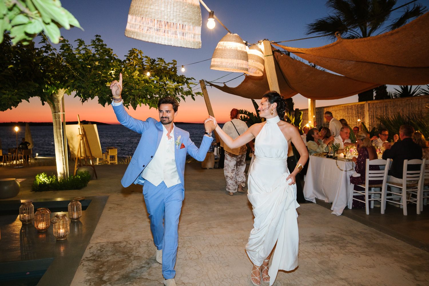Wedding guests dancing and celebrating in Paros