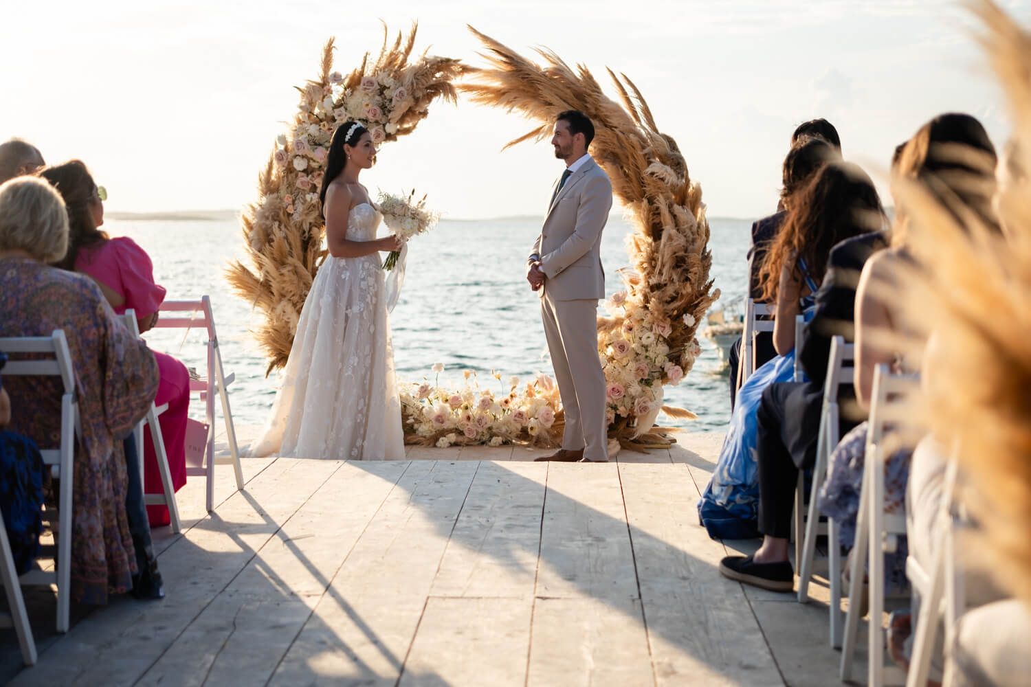 Outdoor wedding altar with stunning floral decorations at Seesoo Paros