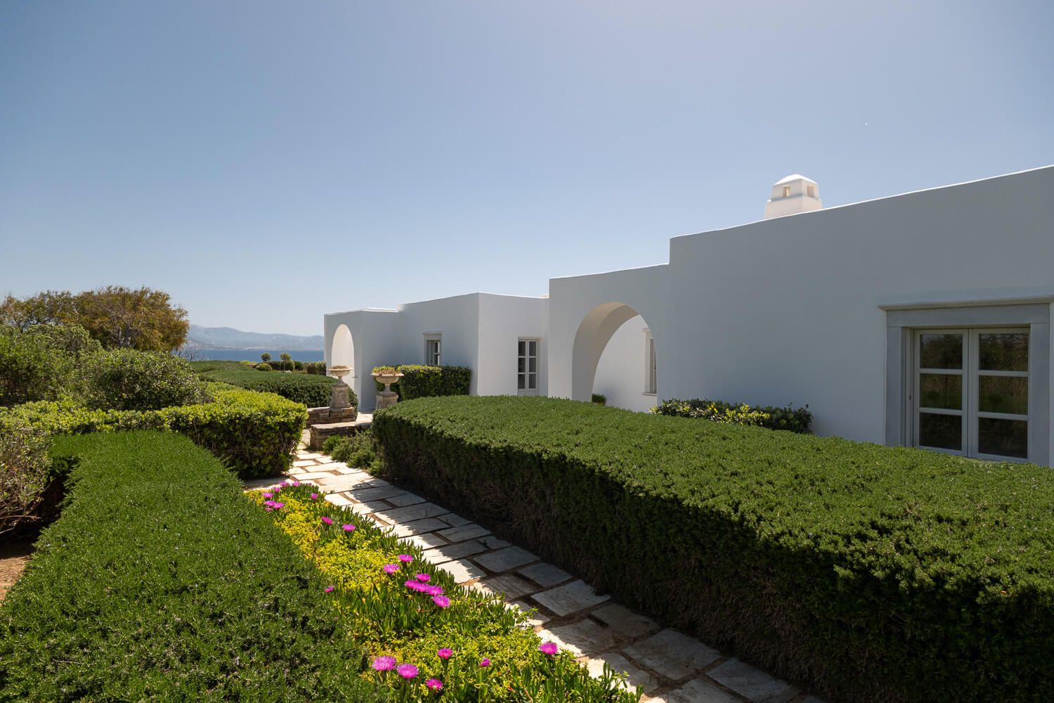 Expansive lush gardens surrounding a luxury Santa Maria property