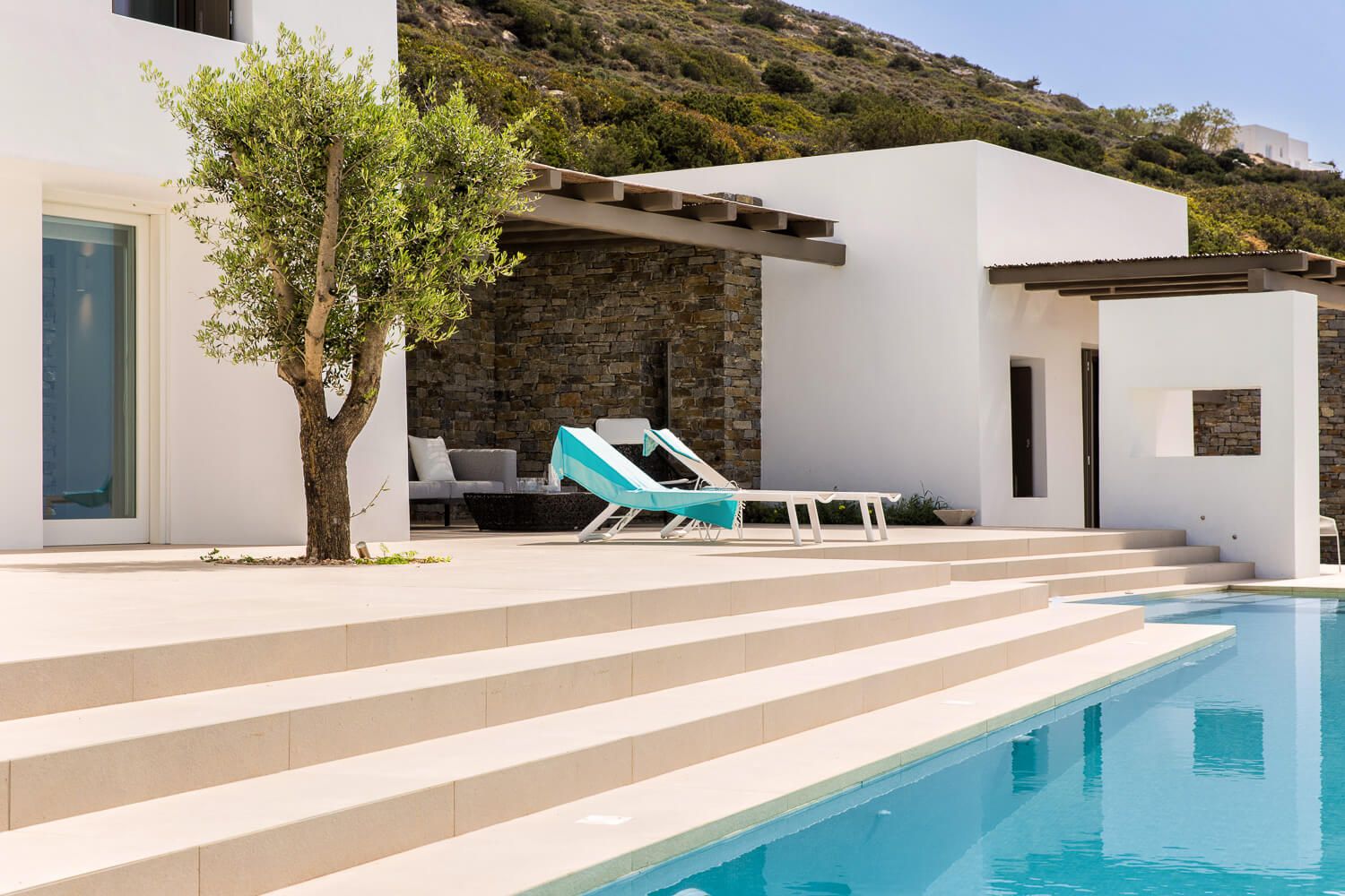 Expansive outdoor environment tailored for sophisticated island living