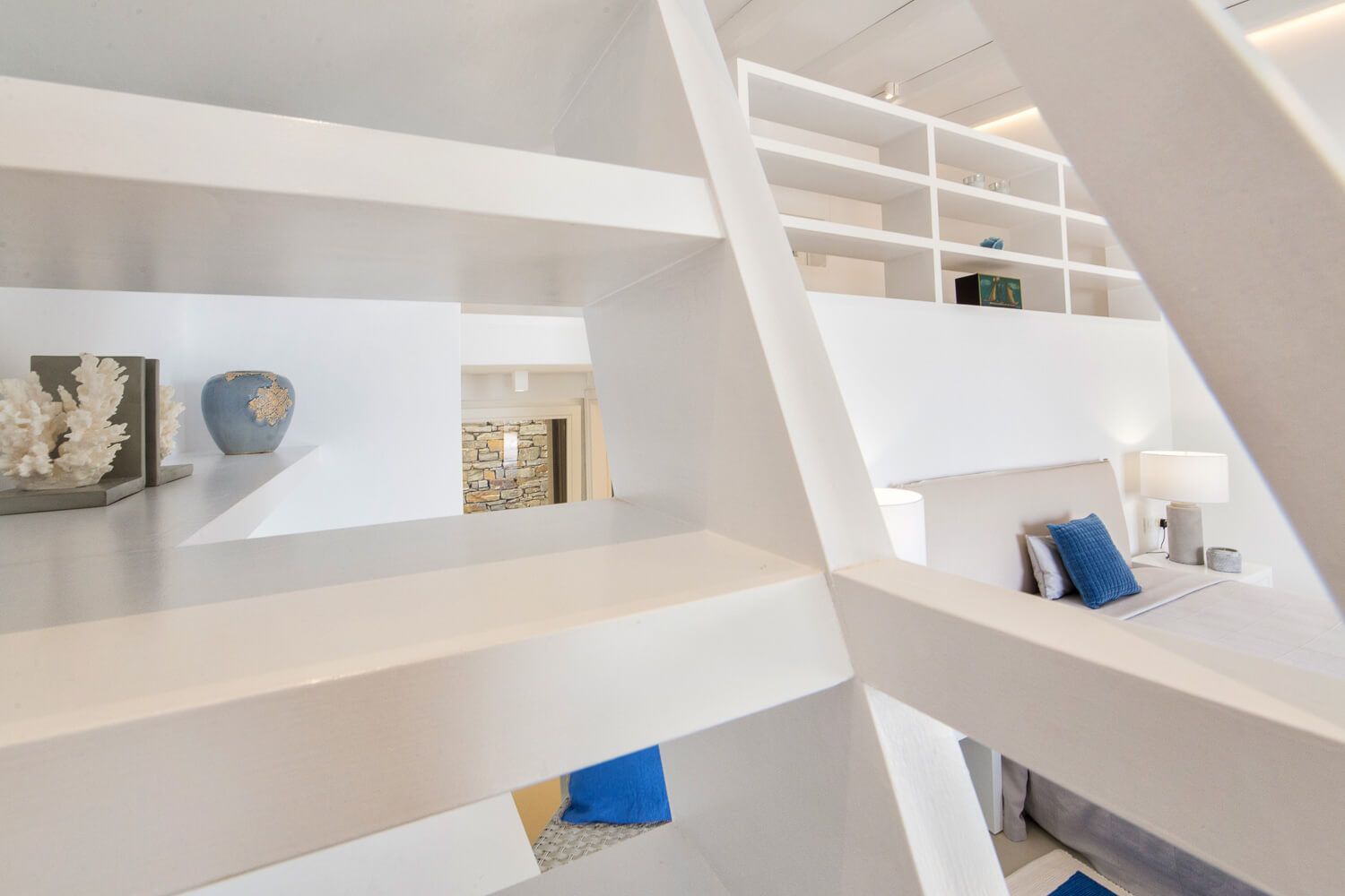 Premium interior styling and comfortable bedding in a 3-level villa