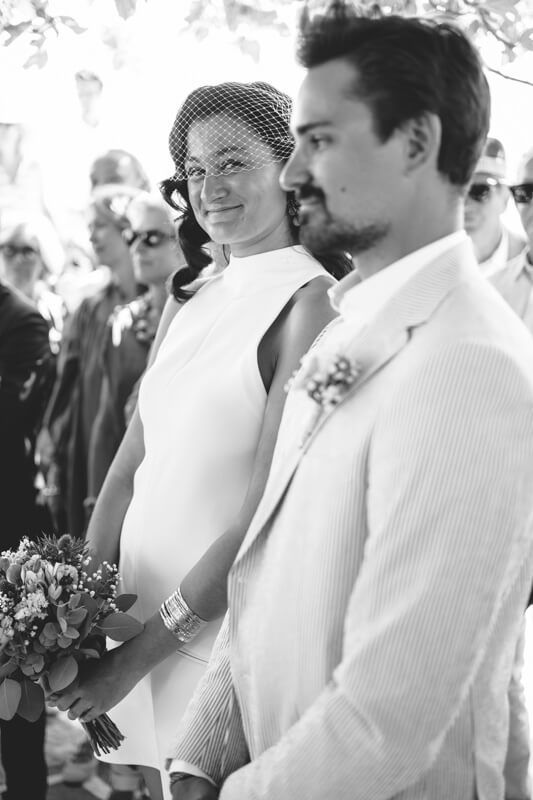 Portrait of a bride looking at the camera, reflecting authentic Wedding photography in the Cyclades.