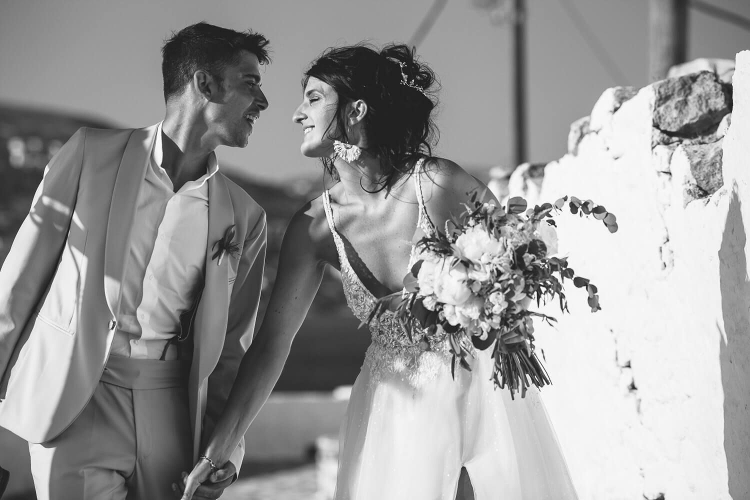 Romantic couple portraits in the stone-paved alleys of Parikia old town