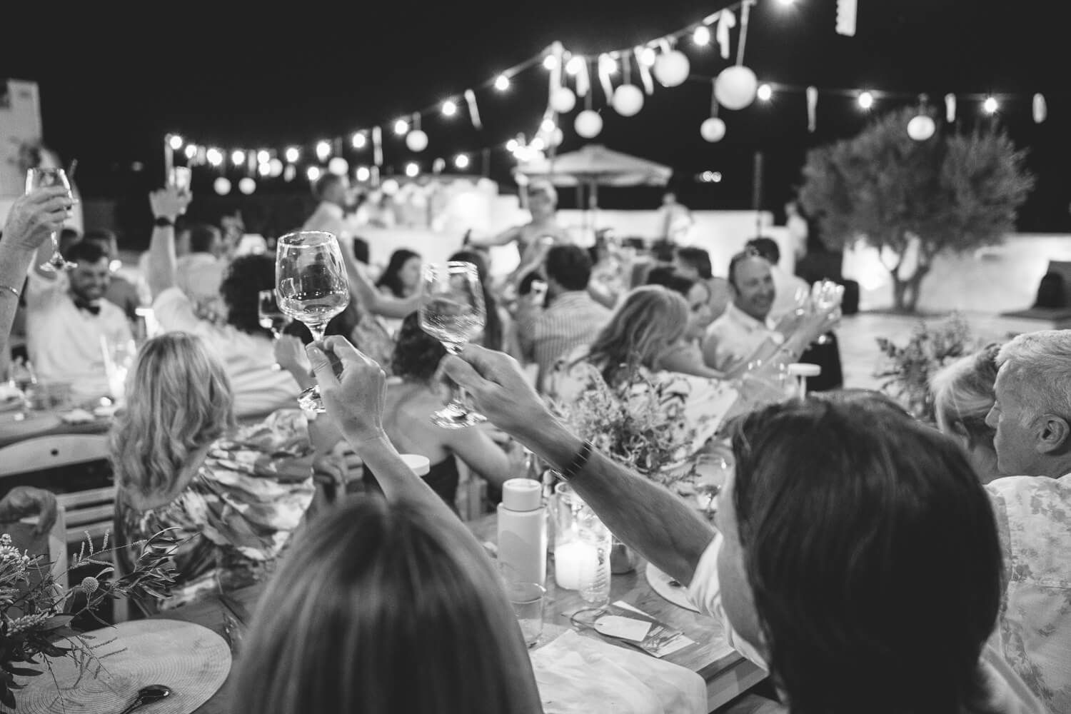 42. Groom Daniel raising a glass during his heartfelt wedding toast