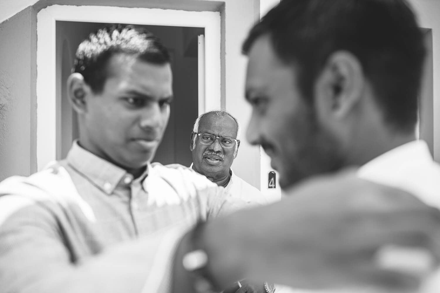 Groom getting ready for his modern Indian wedding at Pyrgaki Paros