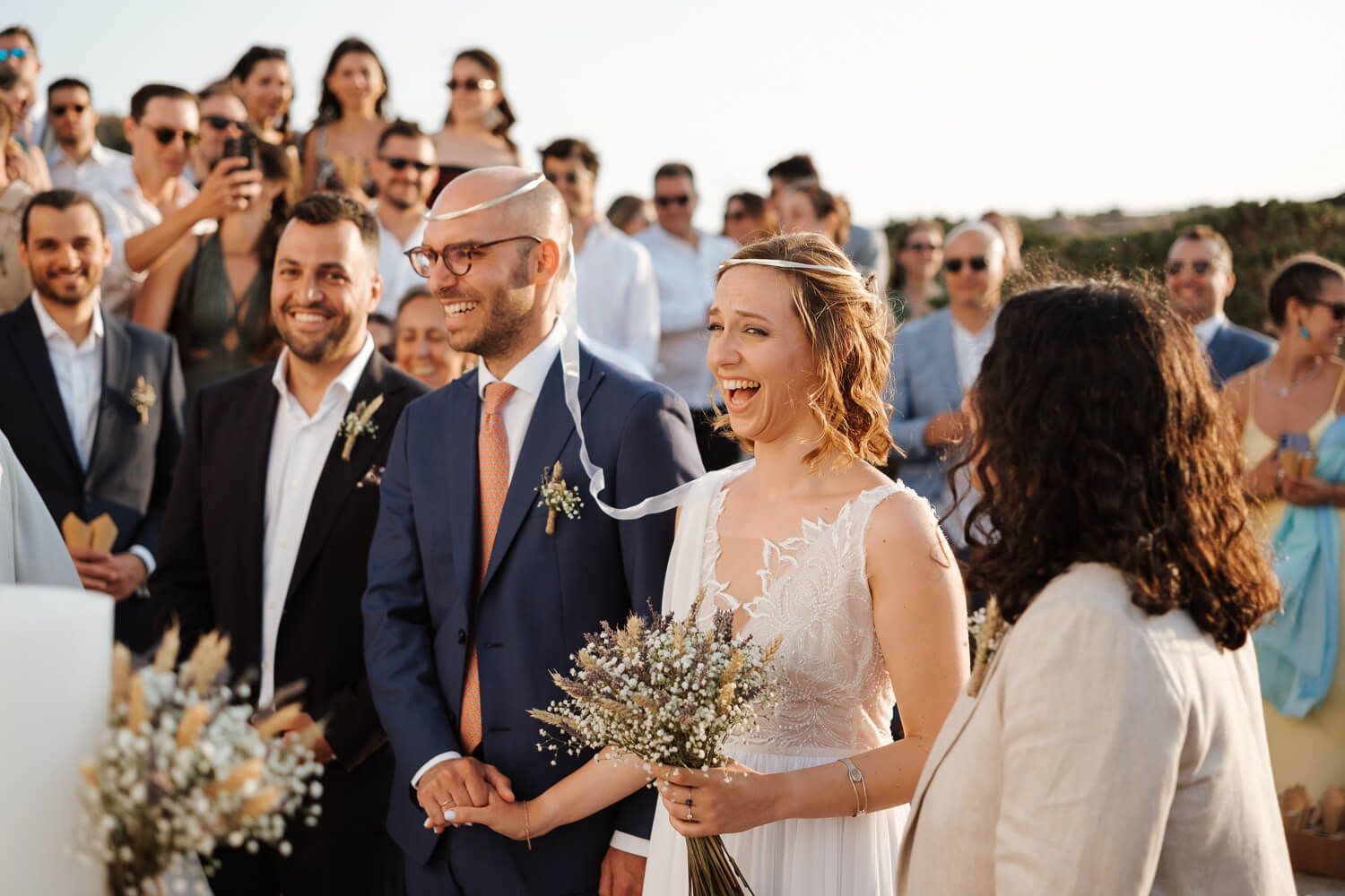 Bride and groom having a laugh during their Paros wedding