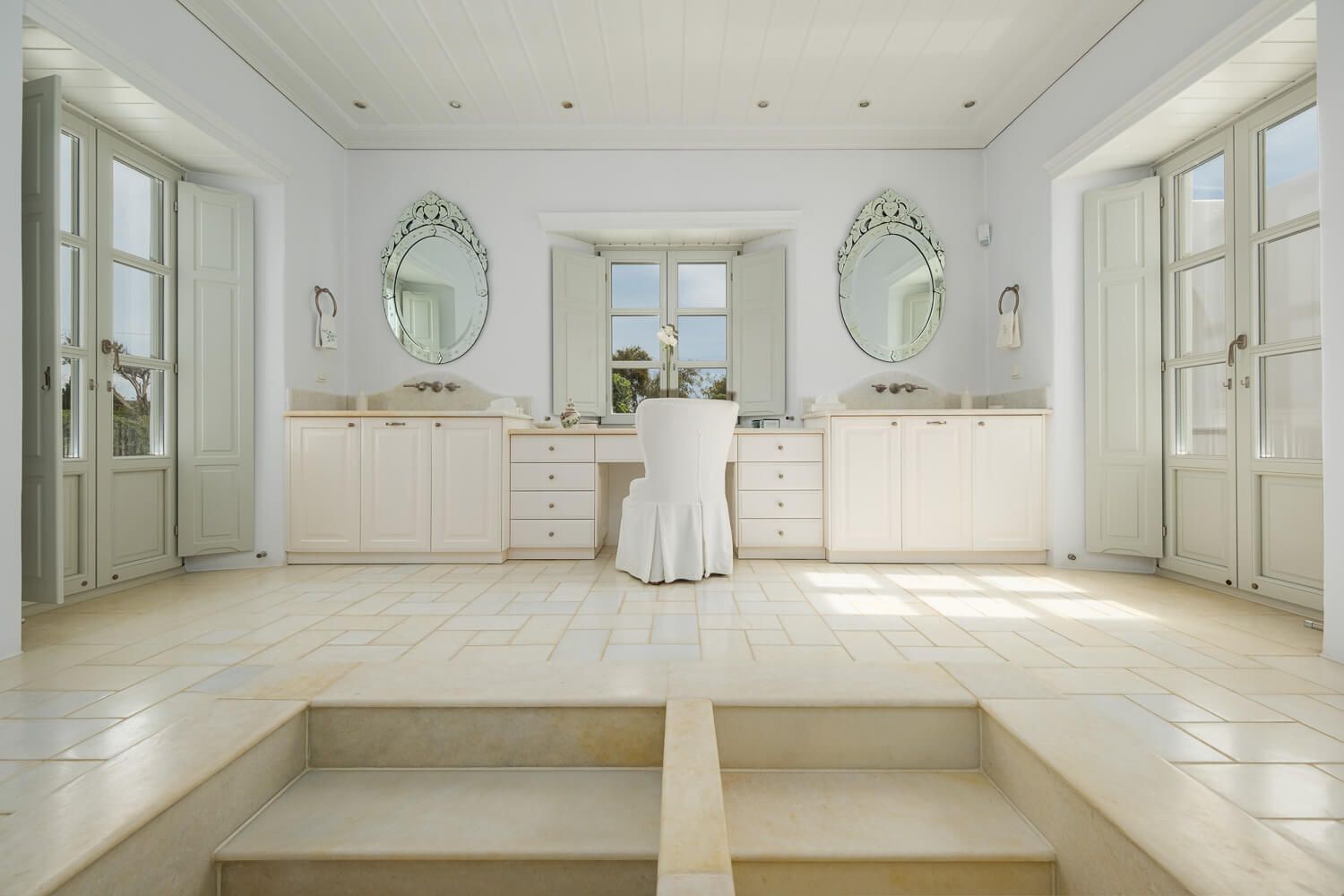 Luxurious bathroom finishes featuring premium imported marble in Paros