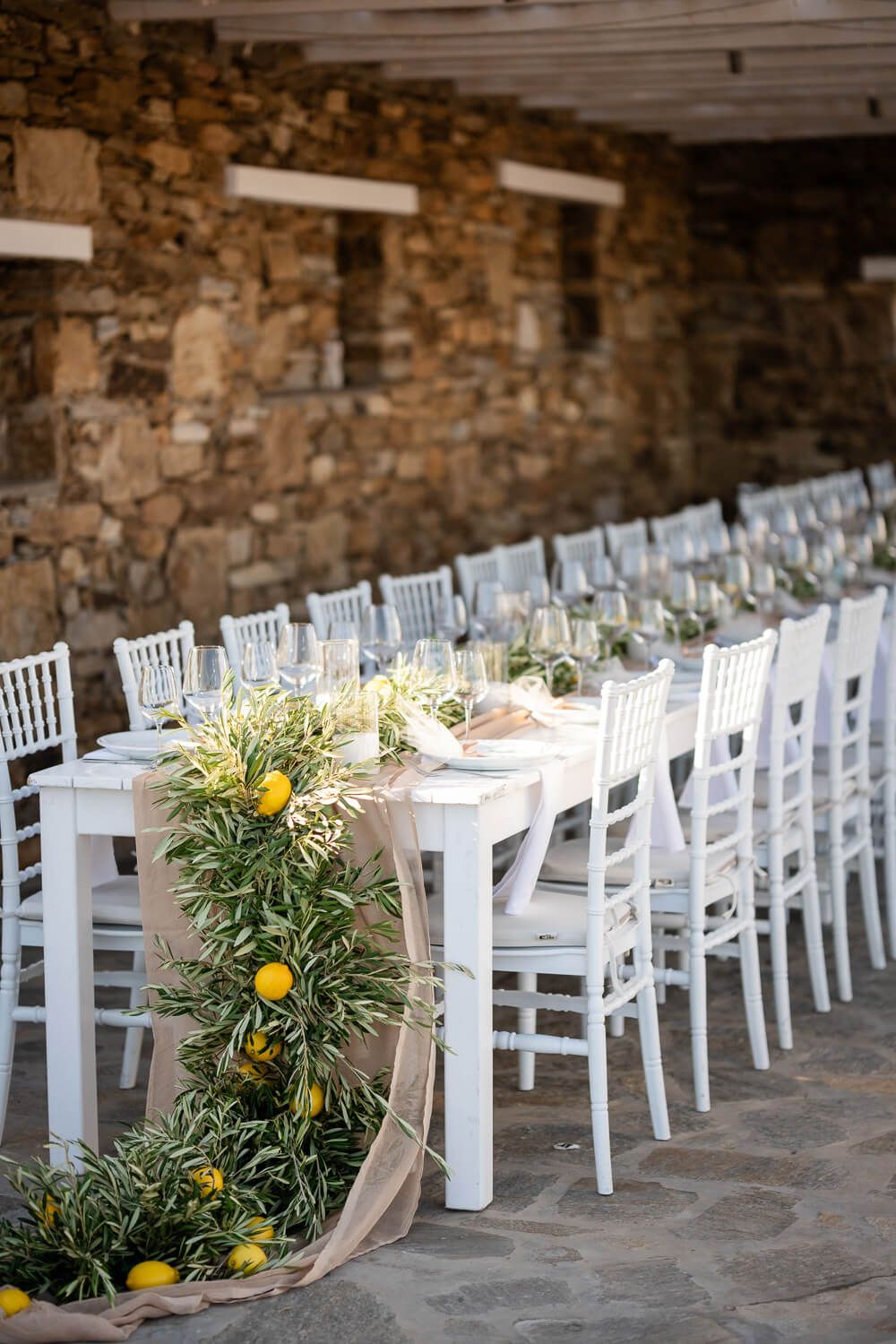 Stunning long monastery table set for a micro wedding dinner at The Secret View
