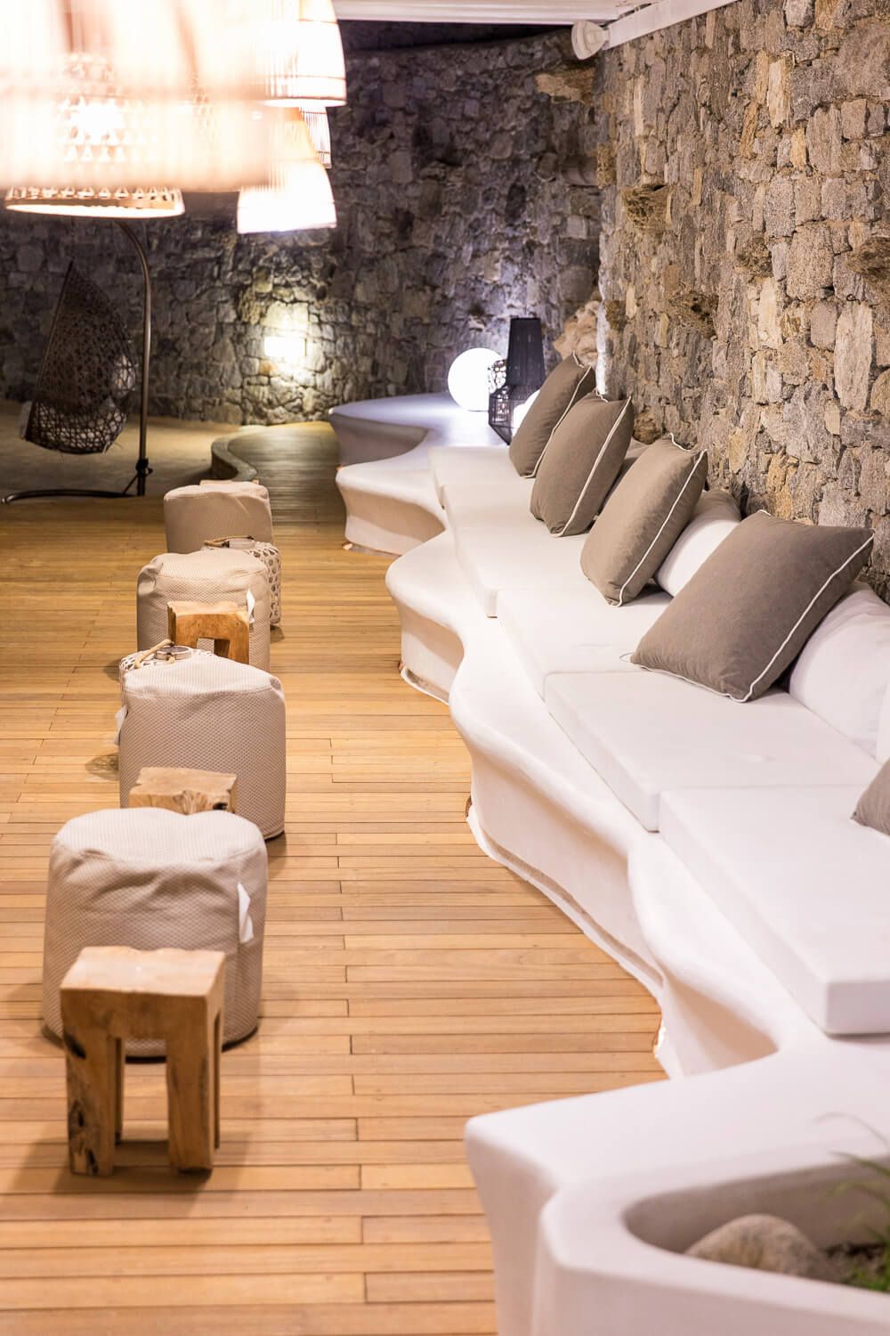 Beautifully lit exterior lounge spaces during the island dusk