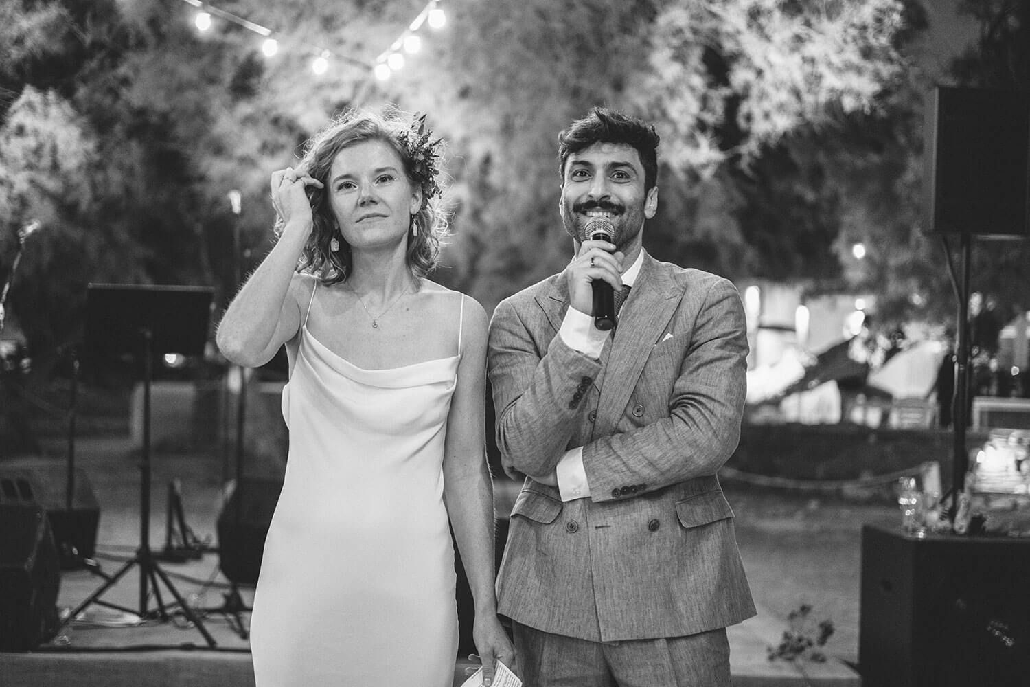 Emotional wedding speeches at a restaurant wedding reception in Greece
