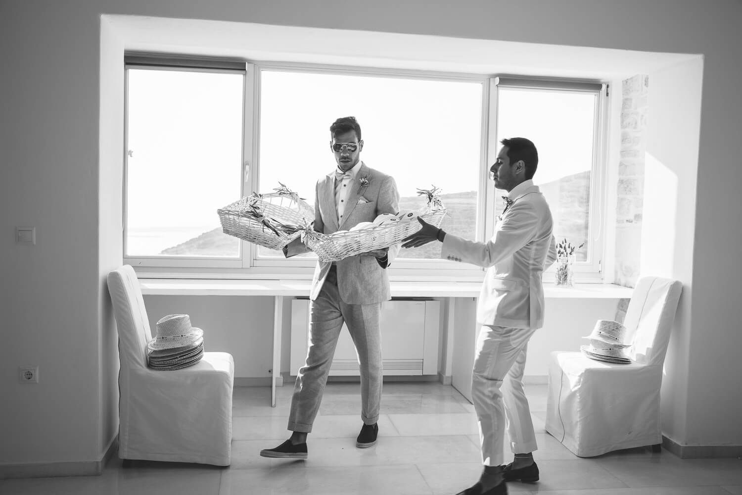 Groomsmen helping with preparations in Paros