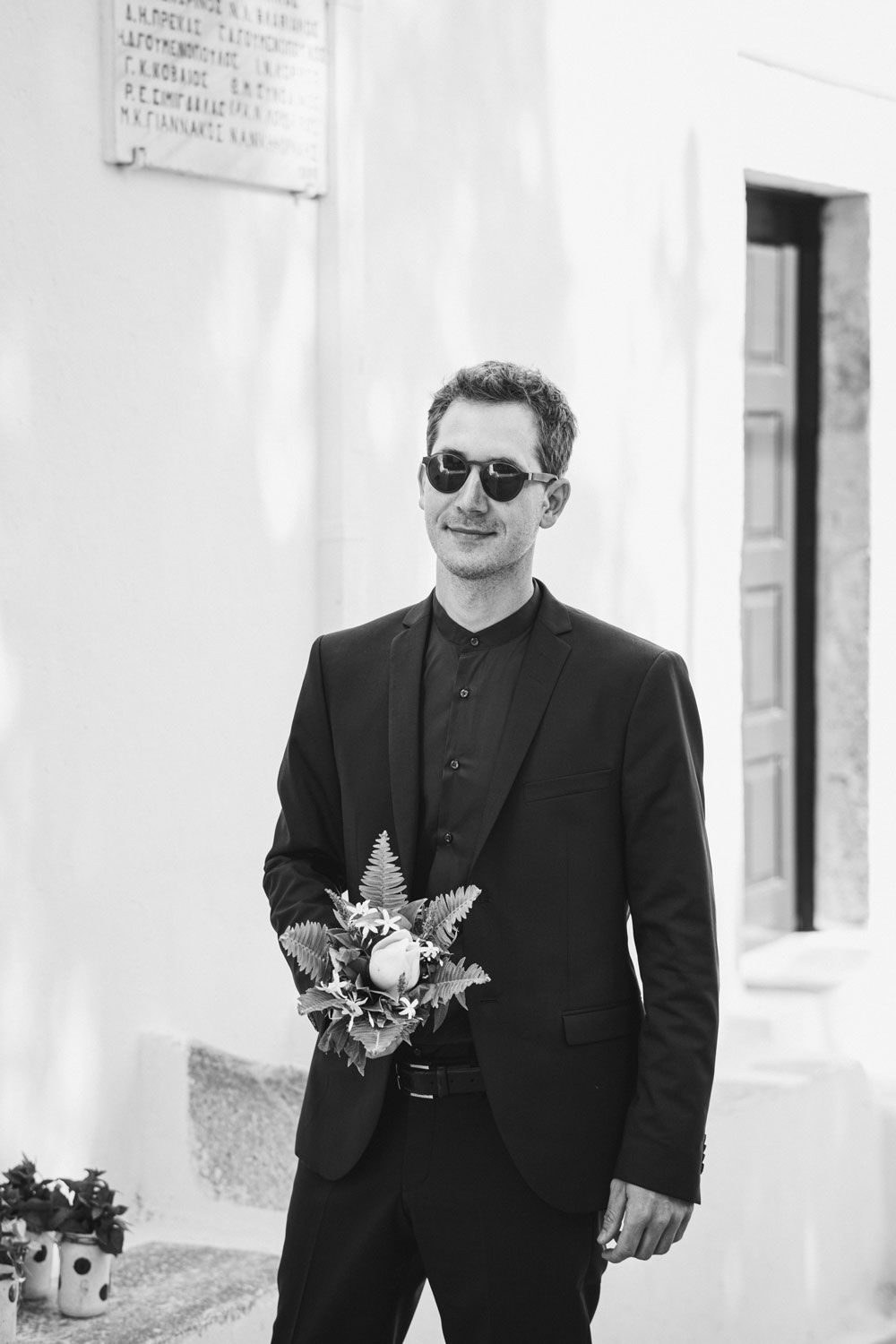 Groom waiting for the bride at Mitropoli Church in Aigiali Amorgos