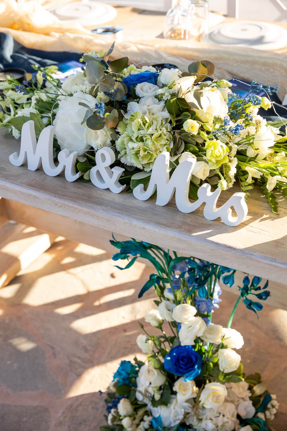 Beautifully decorated outdoor wedding tables at Thalassamou Paros