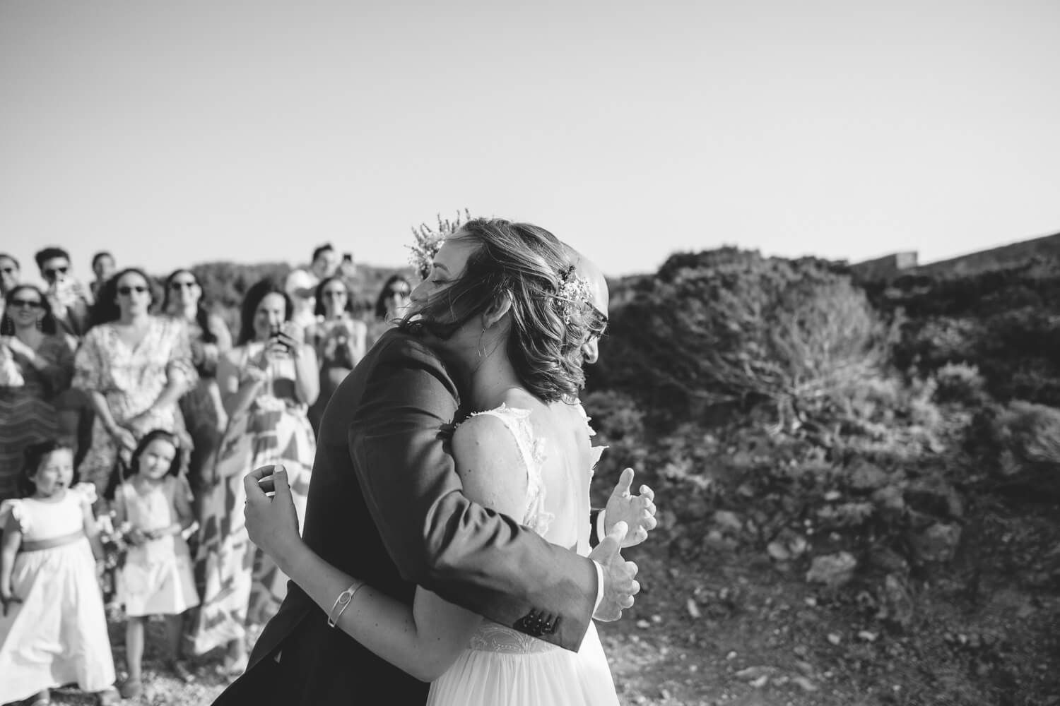 Dimitris hugging Ioanna before their wedding ceremony at  Pyrgaki Paros