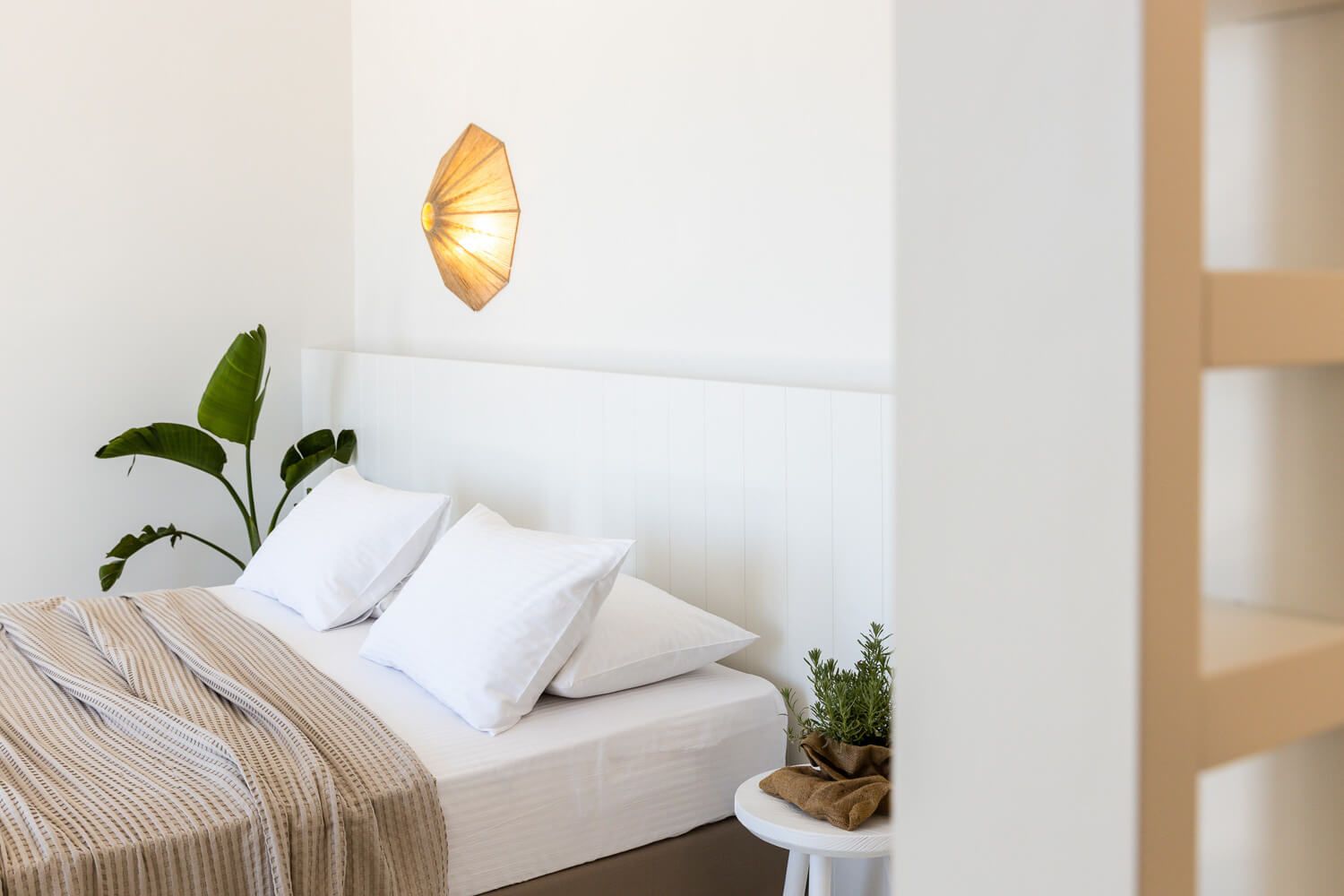 Minimalist luxury translated through carefully chosen textiles at a luxury villa in Paros