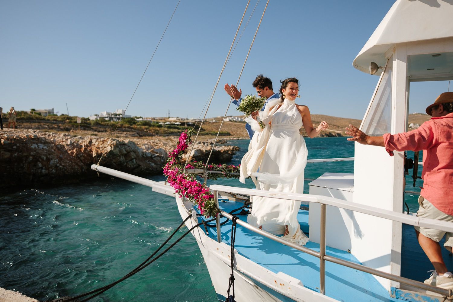 Unposed moments of bride and groom in the Cyclades